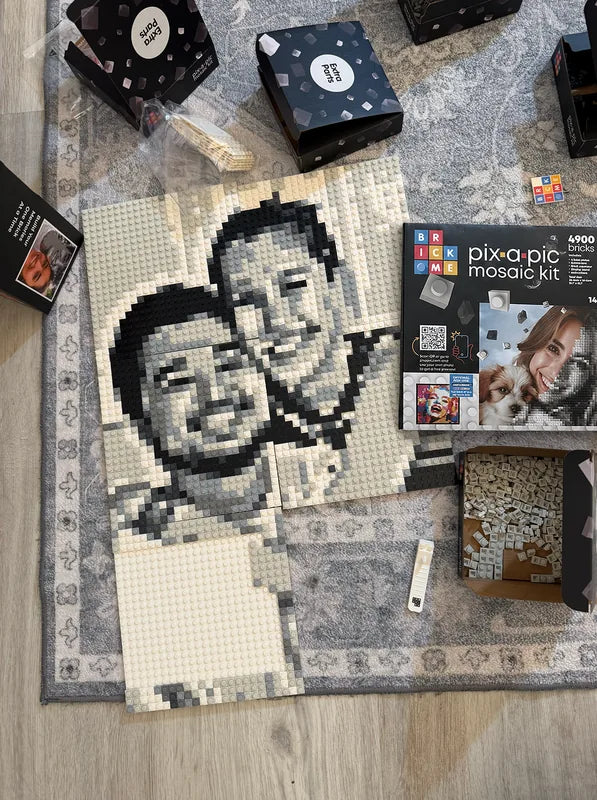 A Pix-a-Pic mosaic kit part-built in classic black and white